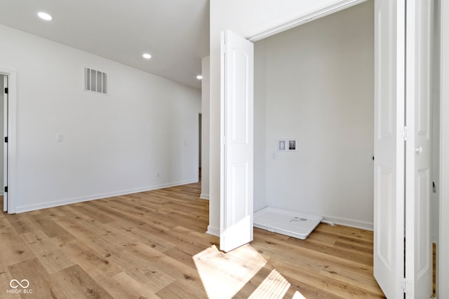 interior space featuring recessed lighting, visible vents, baseboards, and light wood-style floors