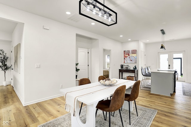 35 N Keystone Ave, Indianapolis, IN 46201 - dining space with light wood-style floors, baseboards, and recessed lighting