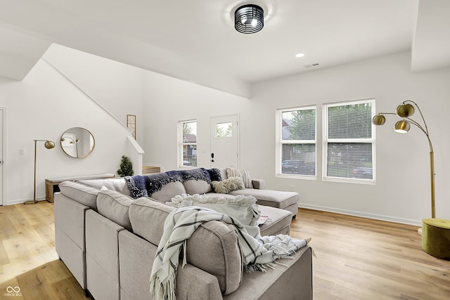 35 N Keystone Ave, Indianapolis, IN 46201 - living room with baseboards, recessed lighting, light wood-style flooring, and visible vents