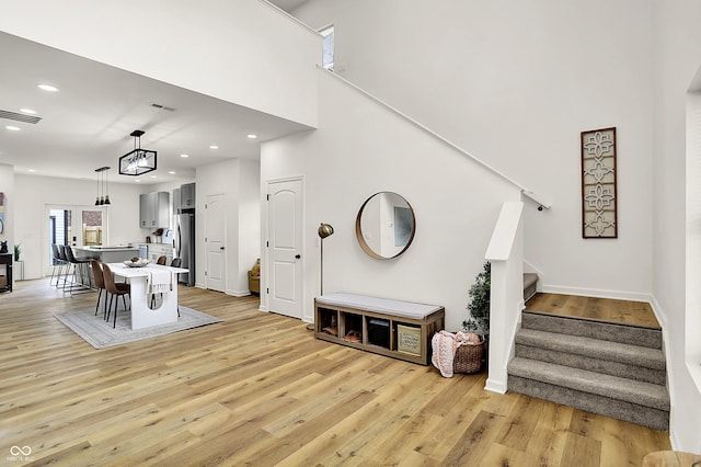 35 N Keystone Ave, Indianapolis, IN 46201 - interior space with recessed lighting, stairway, light wood-style flooring, and visible vents