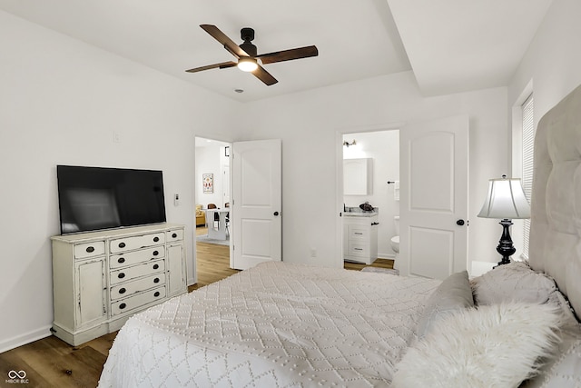 35 N Keystone Ave, Indianapolis, IN 46201 - bedroom with baseboards, ensuite bath, ceiling fan, and wood finished floors