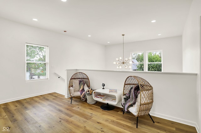 35 N Keystone Ave, Indianapolis, IN 46201 - sitting room with a chandelier, recessed lighting, a healthy amount of sunlight, and wood finished floors