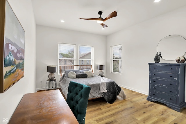 35 N Keystone Ave, Indianapolis, IN 46201 - bedroom with light wood-style floors, baseboards, a ceiling fan, and recessed lighting