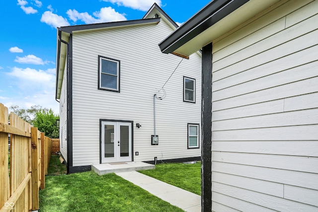 35 N Keystone Ave, Indianapolis, IN 46201 - rear view of property featuring a yard, french doors, and fence