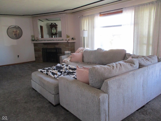 living room with a fireplace and carpet floors