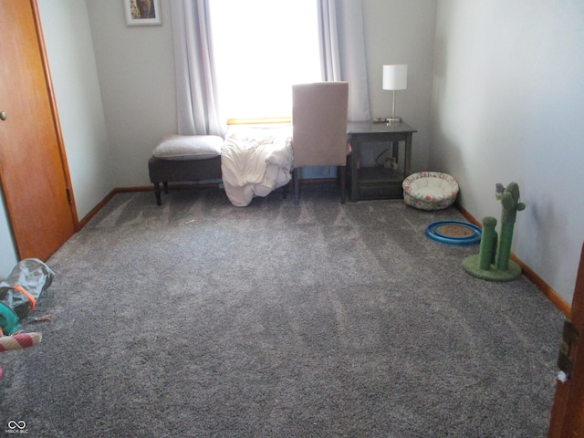 carpeted bedroom with baseboards