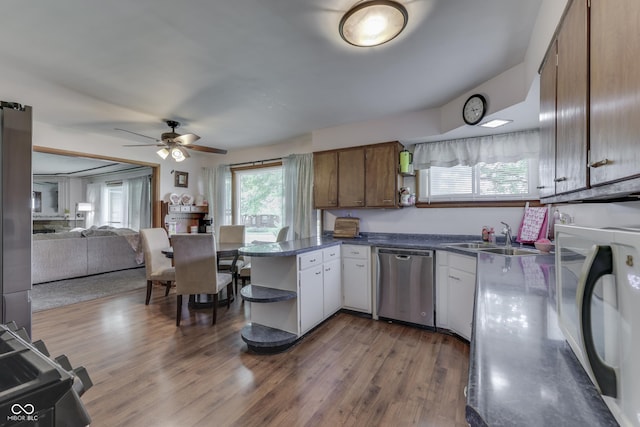 1459 S Josephine St, Martinsville, IN 46151 - kitchen with stainless steel dishwasher, a sink, open shelves, a peninsula, and ceiling fan