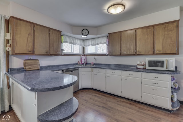 1459 S Josephine St, Martinsville, IN 46151 - kitchen with dishwasher, white microwave, a sink, and dark countertops