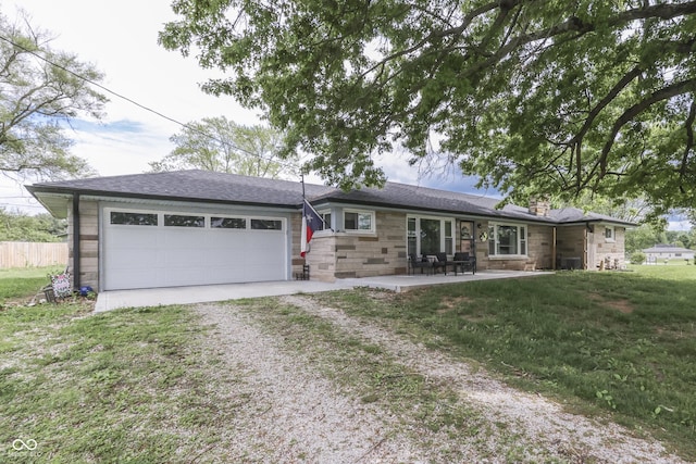 1459 S Josephine St, Martinsville, IN 46151 - single story home featuring driveway, a chimney, stone siding, a garage, and a front lawn