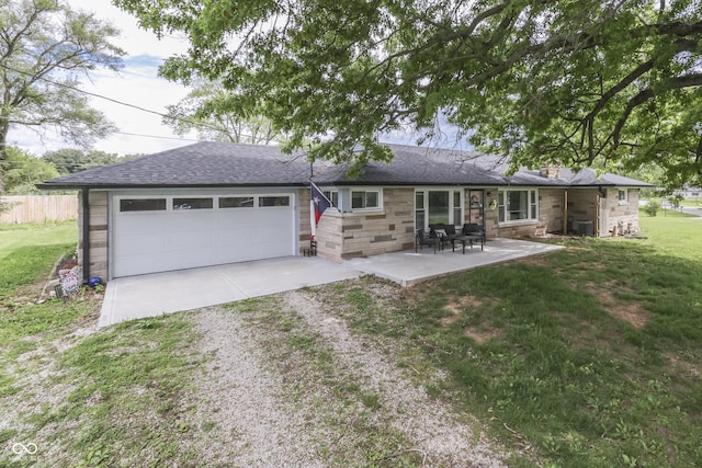 1459 S Josephine St, Martinsville, IN 46151 - rear view of property with dirt driveway, a garage, a chimney, a shingled roof, and stone siding