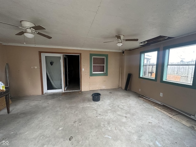 spare room with crown molding and unfinished concrete flooring