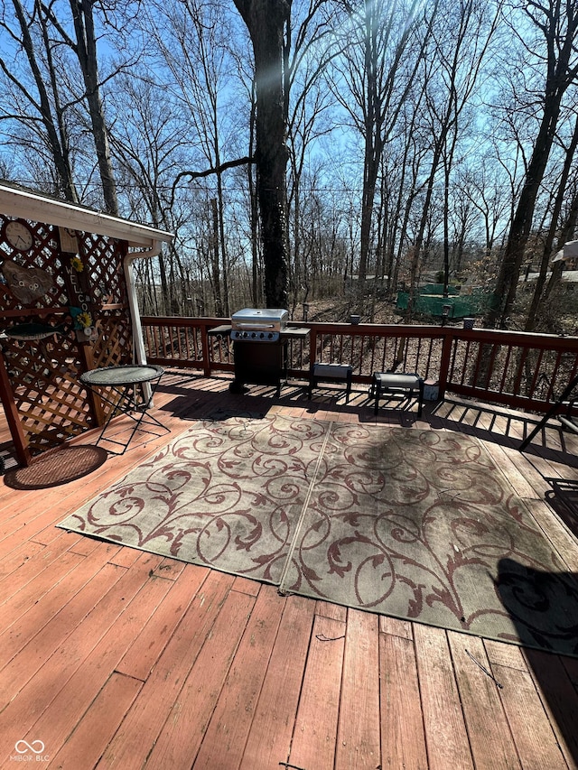 wooden deck with grilling area