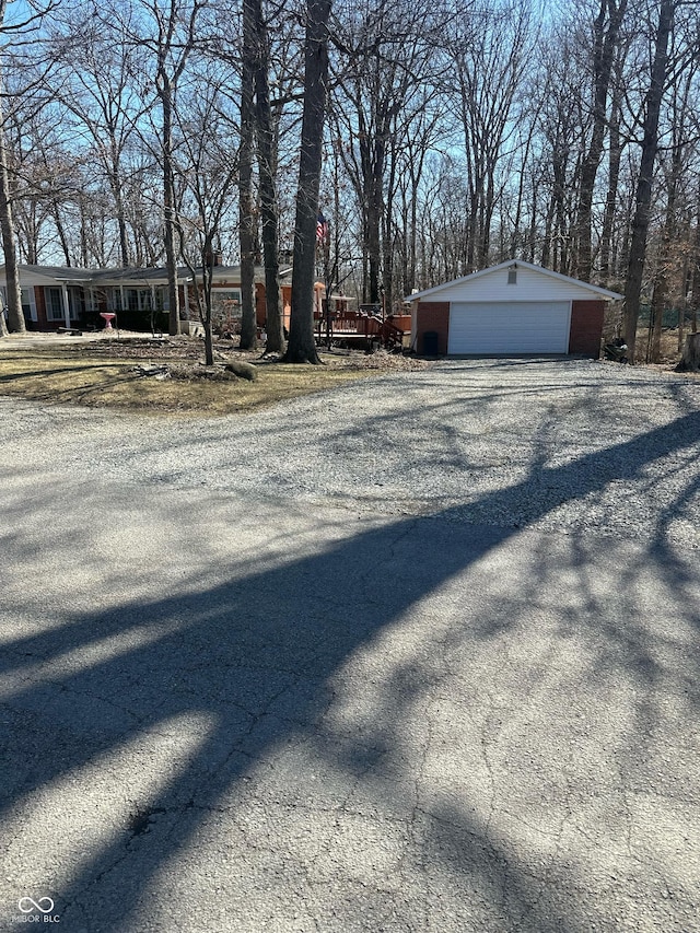 view of road featuring aphalt driveway