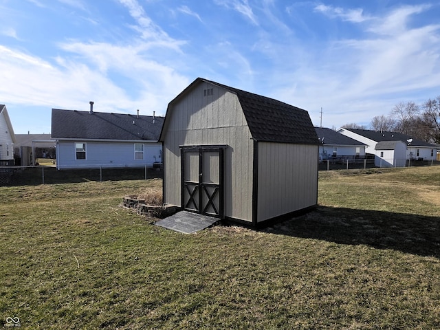 view of shed with fence