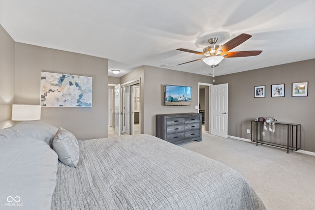 bedroom with baseboards, light carpet, and a ceiling fan