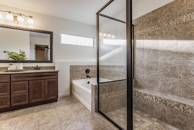 bathroom with vanity, a bath, and a shower stall