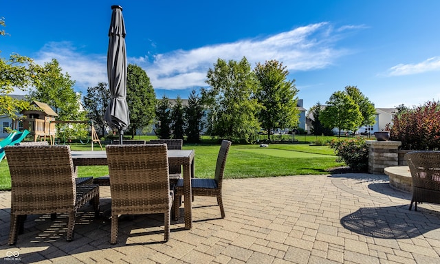 view of patio featuring a playground