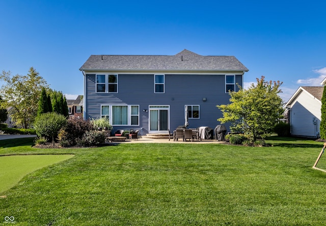 back of property featuring entry steps, a patio, and a yard