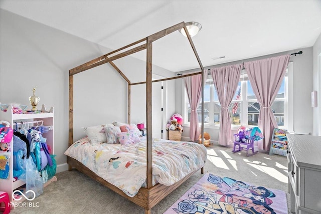 bedroom with visible vents and carpet floors