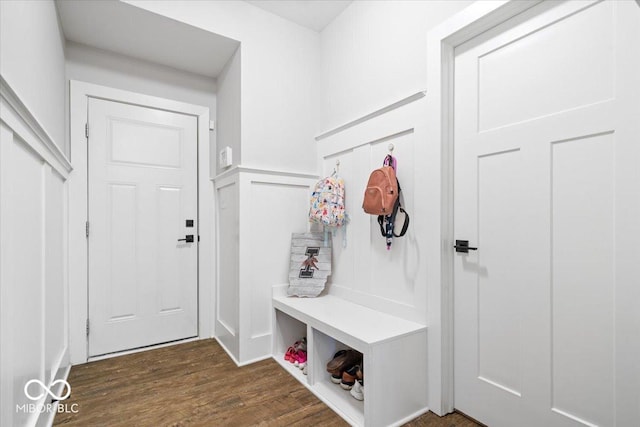 mudroom featuring dark wood-style floors and wainscoting