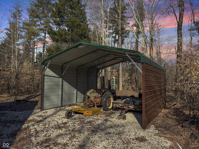 outdoor structure at dusk with a carport