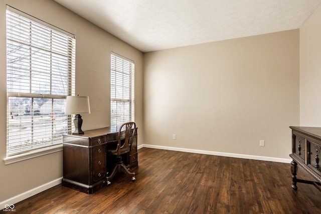 office space featuring dark wood finished floors and baseboards