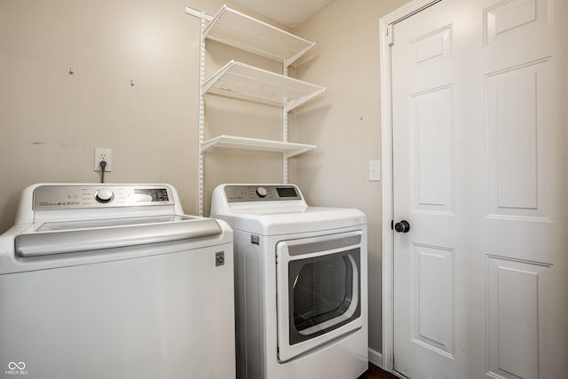 laundry area featuring laundry area and separate washer and dryer