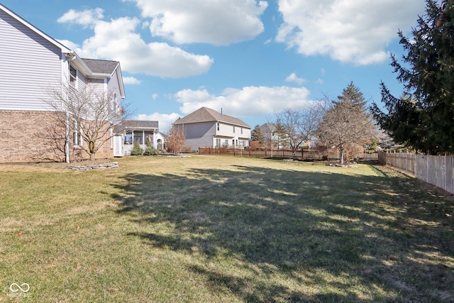 view of yard featuring a fenced backyard