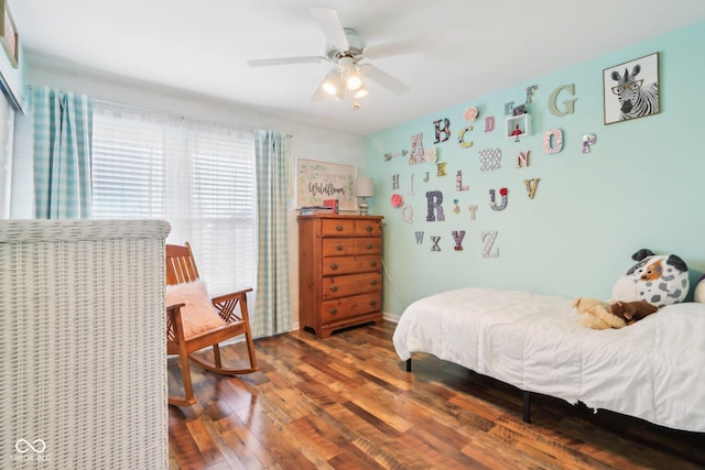 bedroom with wood finished floors and ceiling fan