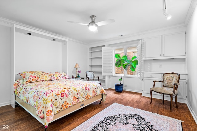 bedroom featuring visible vents, baseboards, and dark wood finished floors