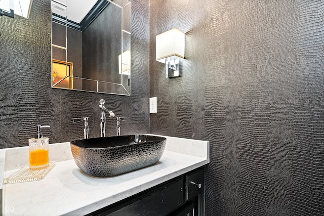 bathroom featuring tile walls and vanity