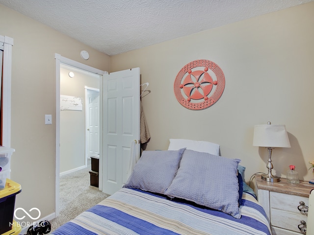 2955 Mars Hill St, Indianapolis, IN 46241 - bedroom with carpet floors, baseboards, and a textured ceiling