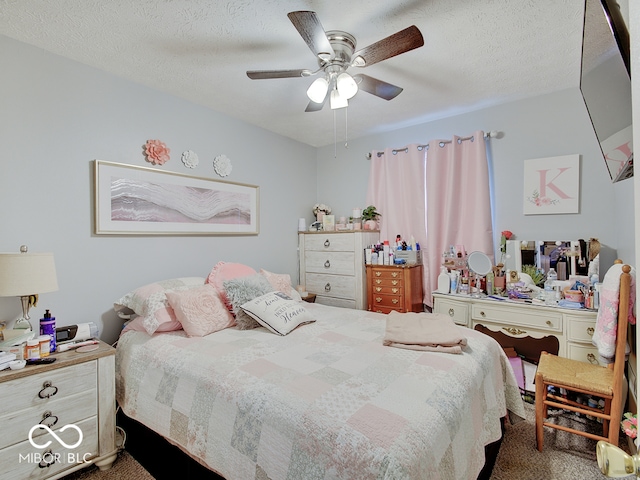 2955 Mars Hill St, Indianapolis, IN 46241 - bedroom featuring dark carpet, a ceiling fan, and a textured ceiling