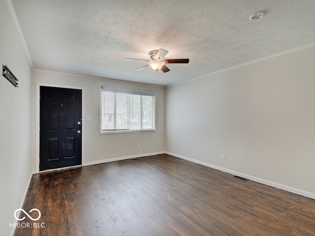 2955 Mars Hill St, Indianapolis, IN 46241 - foyer with a ceiling fan, a textured ceiling, dark wood-type flooring, baseboards, and ornamental molding