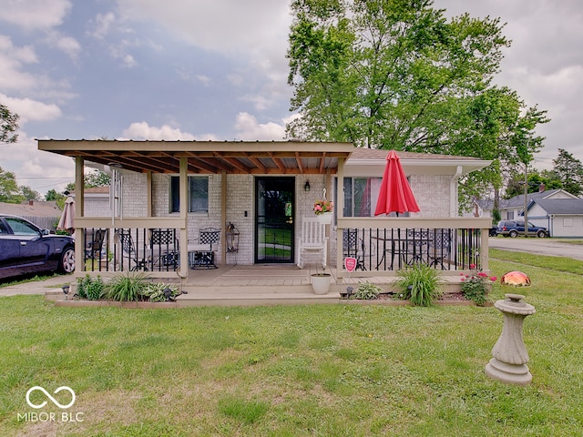 2955 Mars Hill St, Indianapolis, IN 46241 - view of front of house featuring a front yard, a porch, and brick siding