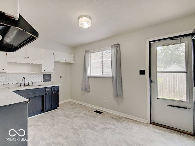 2955 Mars Hill St, Indianapolis, IN 46241 - kitchen featuring a sink, open shelves, light countertops, ventilation hood, and white cabinets