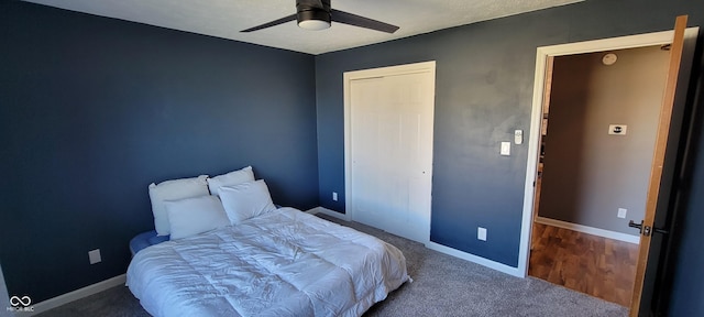 bedroom with baseboards and ceiling fan