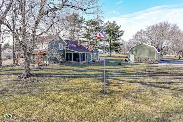 view of yard featuring a sunroom