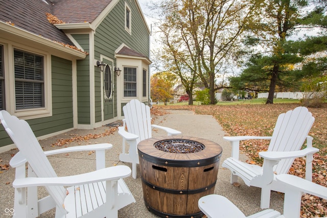 view of patio / terrace featuring an outdoor fire pit