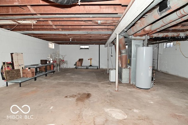 basement with gas water heater and heating unit