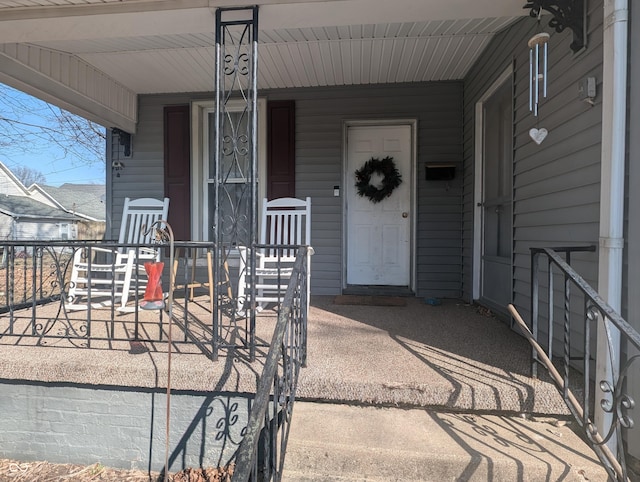 doorway to property with a porch