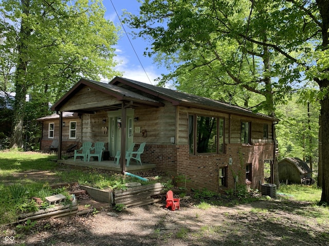 1925 Lee Kay Dr, Rockville, IN 47872 - view of front of property featuring brick siding, a shed, and cooling unit