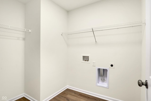 laundry room featuring electric dryer hookup, laundry area, baseboards, hookup for a washing machine, and dark wood-style flooring