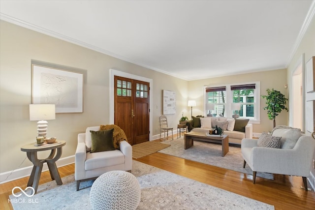 140 E 44th St, Indianapolis, IN 46205 - living room featuring ornamental molding, wood finished floors, and baseboards