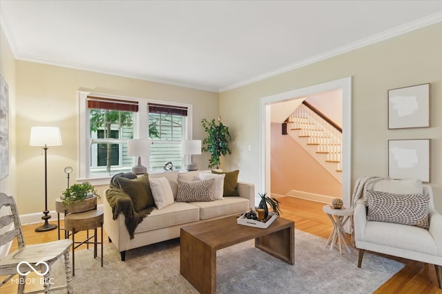 140 E 44th St, Indianapolis, IN 46205 - living area with ornamental molding, stairway, wood finished floors, and baseboards