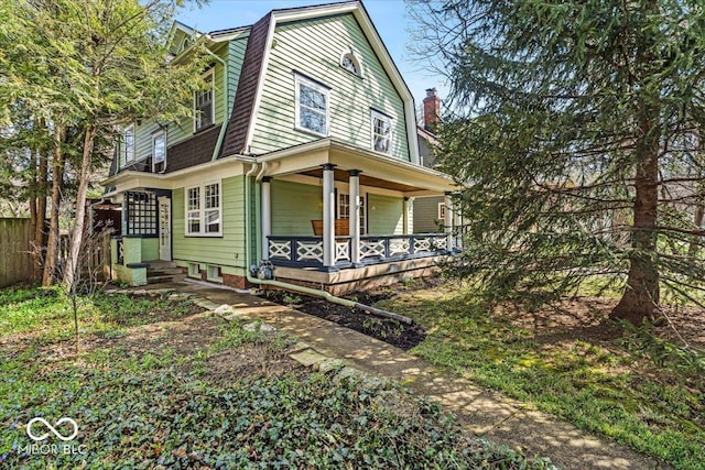 140 E 44th St, Indianapolis, IN 46205 - view of front of home featuring covered porch and fence