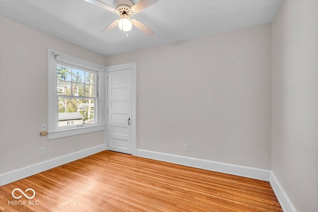 140 E 44th St, Indianapolis, IN 46205 - empty room featuring a ceiling fan, light wood-style flooring, and baseboards