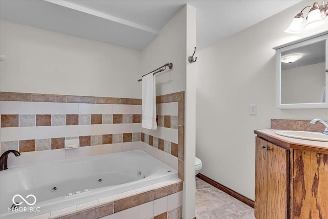 140 E 44th St, Indianapolis, IN 46205 - bathroom featuring a whirlpool tub, tile patterned floors, toilet, vanity, and baseboards