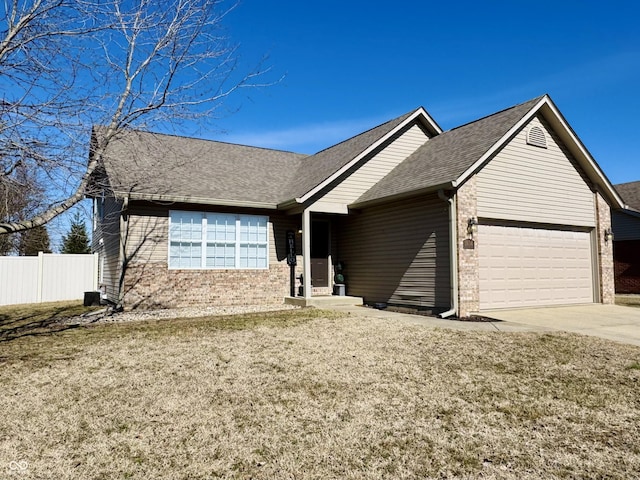 ranch-style home with fence, driveway, a shingled roof, a garage, and brick siding