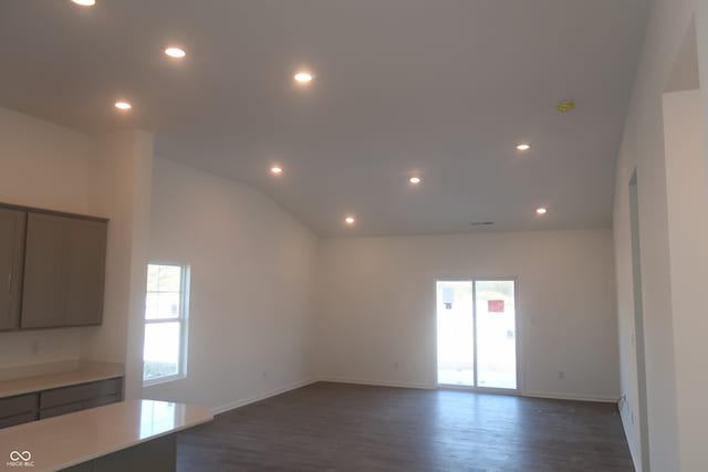 empty room featuring dark wood-style floors, recessed lighting, and a healthy amount of sunlight